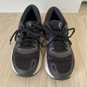 Black Asics running shoes